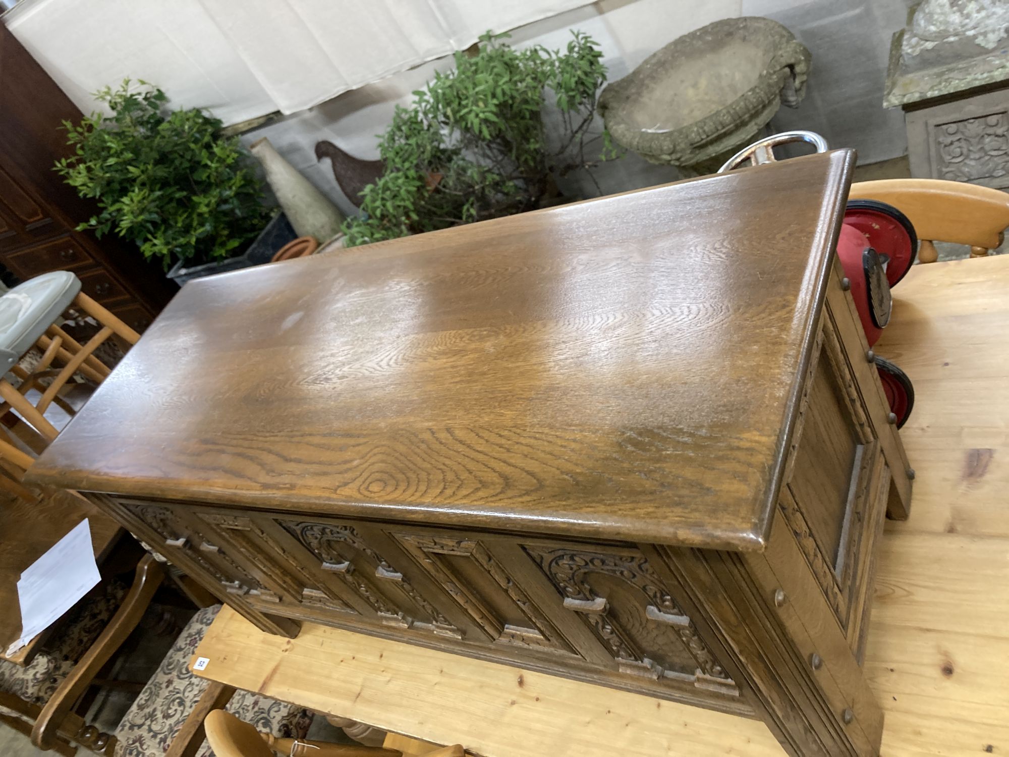 An 18th century style oak coffer, length 114cm, depth 44cm, height 52cm